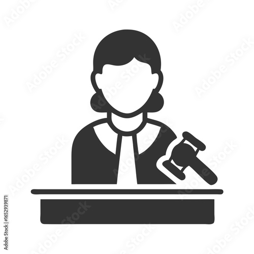 Female judge with gavel and bell in courtroom setting  