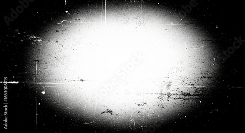 Vintage film reel with spotlight effect and distressed texture