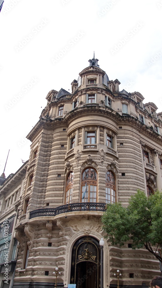 Fototapeta premium Building with ornate architectural details on a corner in Buenos Aires, Argentina