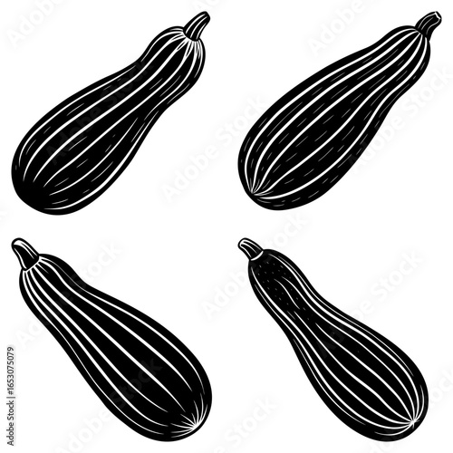 Four stylized black and white zucchinis with vertical lines arranged on a white background image