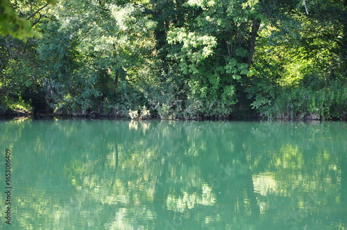 Mreznica river on hot summer day. The Mreznica is a river in Karlovac County, Croatia.River in the deep forest. Mreznica river near Duga Resa. Croatia.