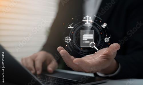 Photos Businessman holding digital legal document icon with law justice scale contract