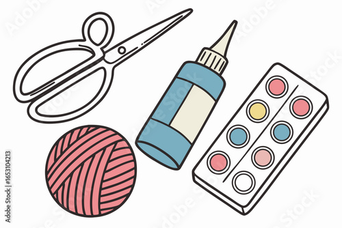 Craft supplies including scissors yarn glue and watercolors