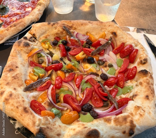 pizza with vegetables and anchovies