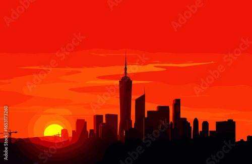 Silhouette of a city skyline at sunset with vibrant orange and red sky