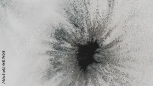 Ink spot. Pigment spill. Black blotch spatter spread fluid wet white paper texture. Art explosion round reveal abstract background.