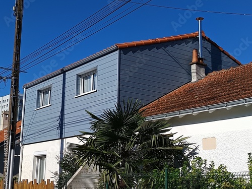 Surélévation maison de toiture en tuiles