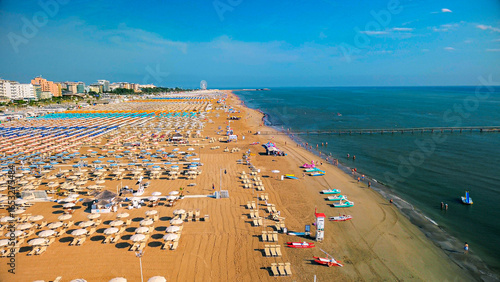 Tableau sur toile Aerial view of large equipped sandy beaches