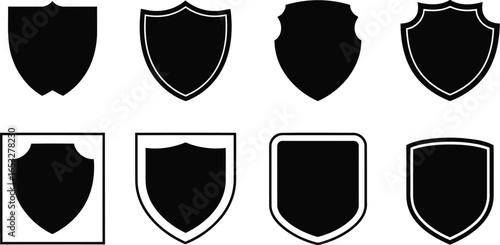 A set of glossy security shield icons with metal frames, medieval heraldic crests, and protection symbols