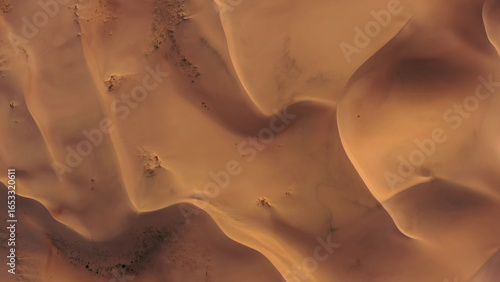 Aerial top view on sand dunes in desert