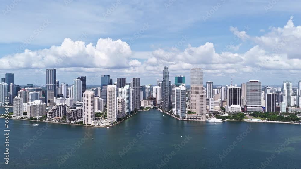 Aerial view of Brickell skyscrapers. Brickell cityscape of downtown Miami. Miami Brickell skyline above the coastline. Brickell Key aerial view in Miami. Landscape of Miami. Aerial view of Brickell skyscrapers. Brickell cityscape of downtown Miami. Miami Brickell skyline above the coastline. Brickell Key aerial view in Miami. Landscape of Miami.