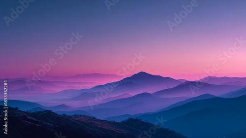 Misty Mountains at Sunset. Mountains appear layered at twilight. Use for inspirational designs, travel blogs, nature marketing.