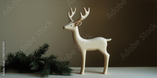 Decorative White Reindeer Figurine With Greenery on Marble Surface in Cozy In...