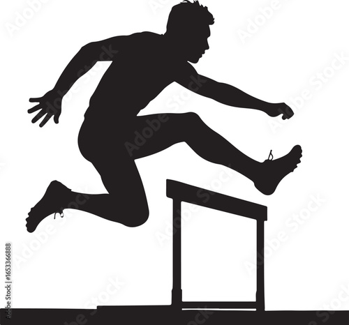 Black silhouette of a male athlete jumping over a hurdle during a race track and field