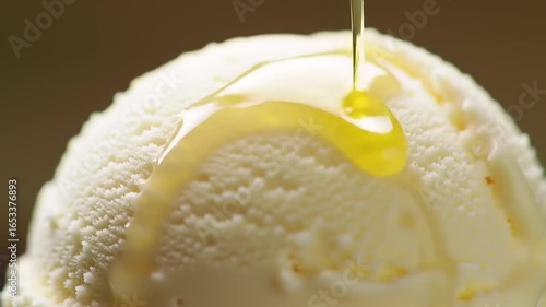 Close-up of ice cream with syrup drizzled