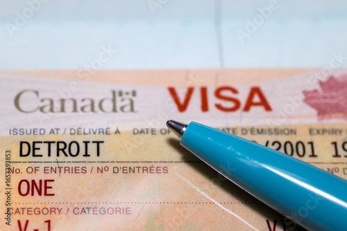 Close up view of Canadian non immigrant visa stamp on the passport issued at Detroit.