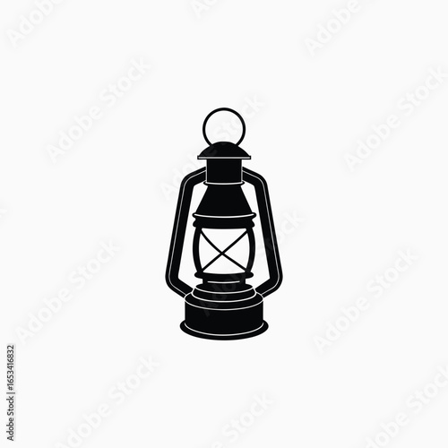 Black silhouette of an old kerosene lantern Keywords: lantern, kerosene lamp, oil lamp, vintage