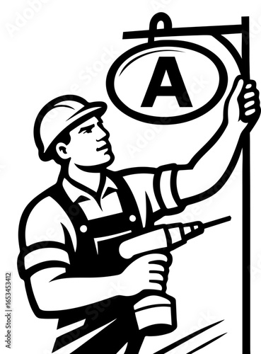 Sign installer working with a drill to set up a display sign