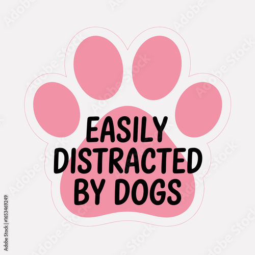A pink paw print with the text easily distracted by dogs written on it, isolated on white background the image is a cute and funny way to show your love for dogs