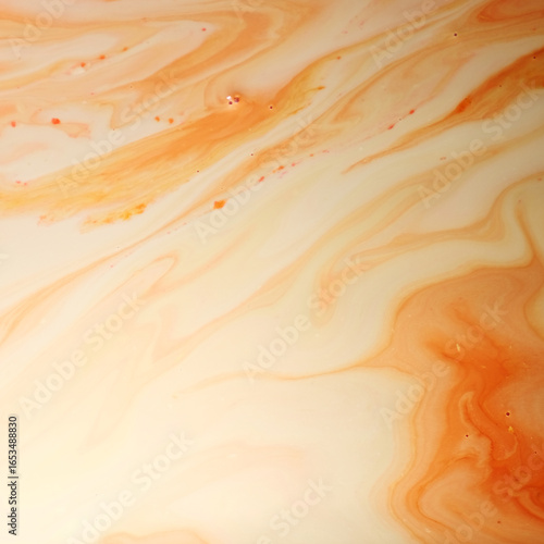 Mixture of fresh milk and black tea formed beautiful abstract as background