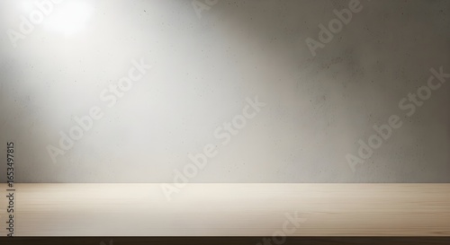 Wallpaper Mural Minimalist studio background featuring an empty wooden table under a spotlight, set against a gray textured wall for product presentation. Torontodigital.ca
