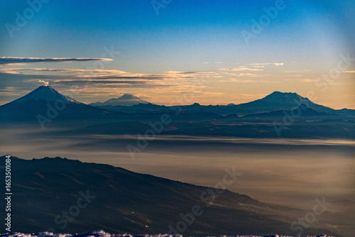 Ecuadorian volcanoes from the summit o Chimborazo: Cotopaxi, Cayambe, Antisana.. 