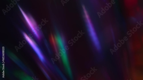 Iridescent lens flare. Soft focus color transition. Dreamlike lens flare on a dark background