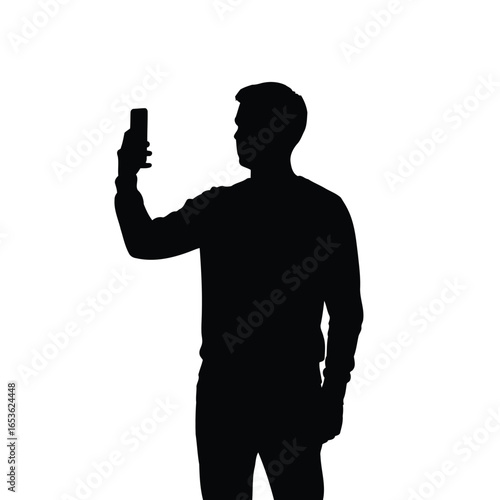 Vector illustration of silhouette of a man holding a smartphone isolated on white background