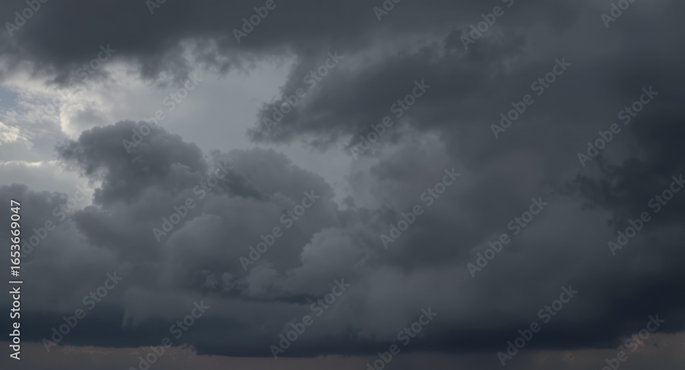 Fototapeta premium Dramatic Dark Storm Clouds Stock Photo Heavy, Ominous Sky Background