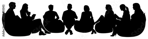 Silhouette of People Sitting in Circle on Beanbags