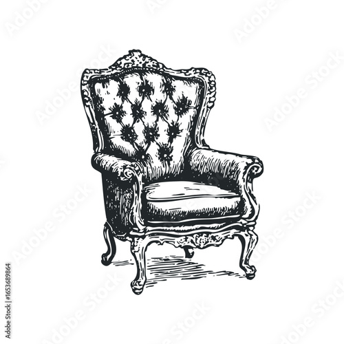 Antique upholstered armchair with ornate carved legs