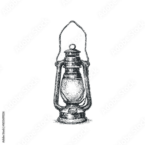 Vintage kerosene lantern with wire handle and glass chimney