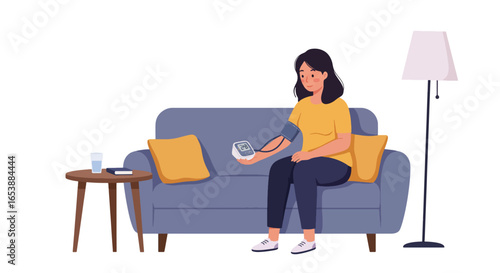 Young Woman Measuring Blood Pressure at Home.