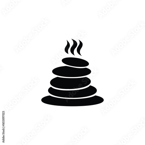 Stack of hot stones with steam for spa and wellness