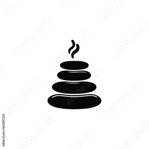 Stack of hot stones with steam for spa and wellness