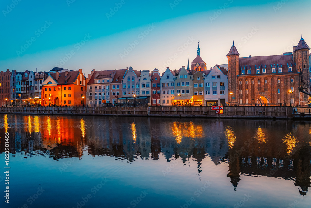 Obraz premium Gdansk with Motlawa river in Poland. Old town colourful house with Stragania Gate