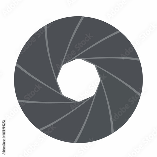 Illustration of a camera aperture, showing the diaphragm blades forming a circular opening.