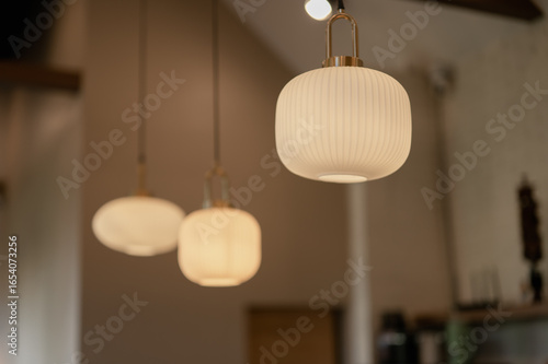 Wall and ceiling lamps in a room interior with lighting and decoration