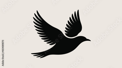 A silhouette of a bird with its wings spread against a light background, flying in the air gracefully