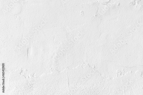 White concrete wall texture background. Uneven render stucco white painted concrete wall texture background. Rough and grunge wall in the sun.