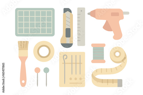 Crafting and sewing tools collection with glue gun, scissors, ruler, needles, thread, tape measure, and paintbrush