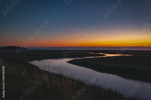 vue du Havre de Blainville sur mer au crépuscule, depuis la route de la mer