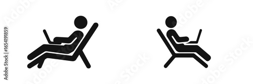 Relaxed posture of a person using a laptop while reclining