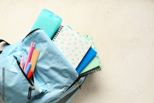 Light blue backpack with sc...