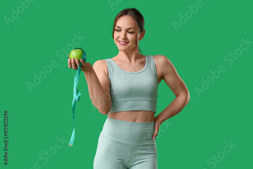 Young woman in sportswear w...