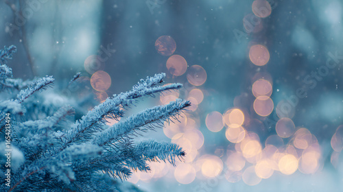 Snow-covered spruce branches in a winter forest, evoking a magical Christmas atmosphere.