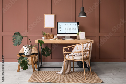 Stylish workplace with mode...