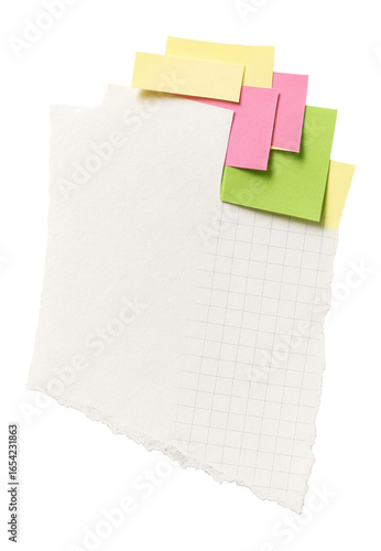 White ripped paper scrap with torn graph paper edge and sticky notes.