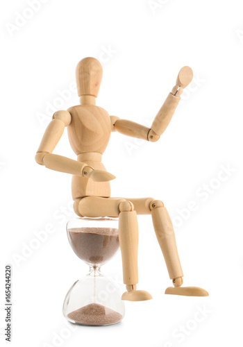 Wooden mannequin sitting on...