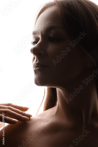 Silhouette of beautiful woman on white background, closeup